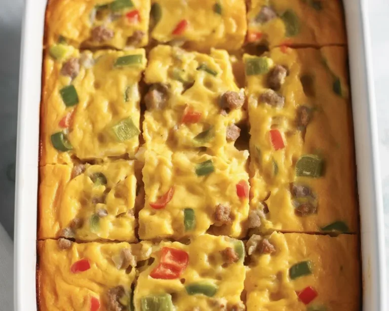 Delicious Breakfast Casserole with eggs, sausage, cheese, and hash browns for brunch.