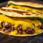 Mouth-watering smash burger tacos with beef patties and toppings.