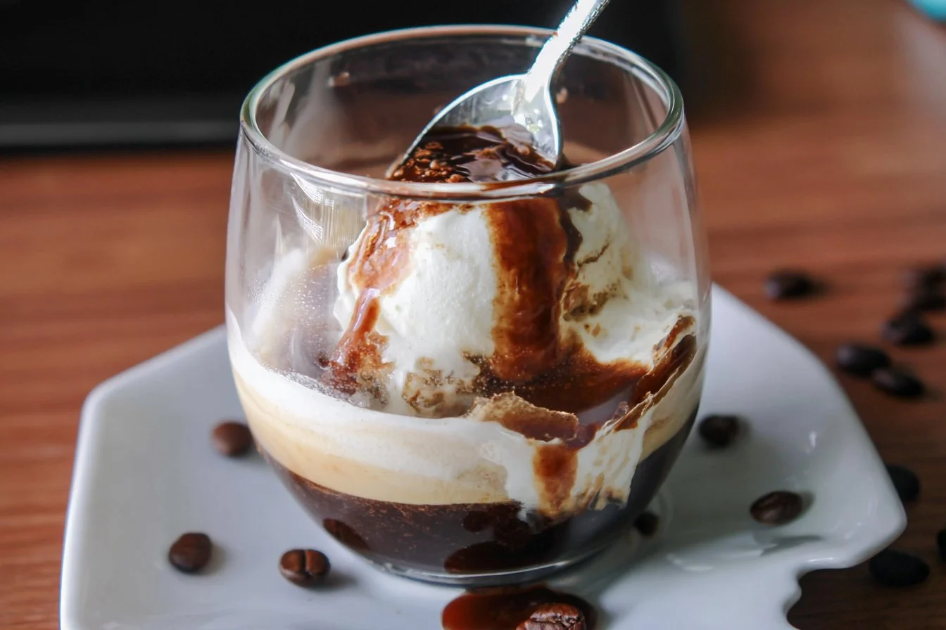 Delicious affogato dessert with espresso poured over vanilla ice cream.