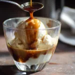 Delicious Italian affogato dessert with espresso poured over creamy gelato