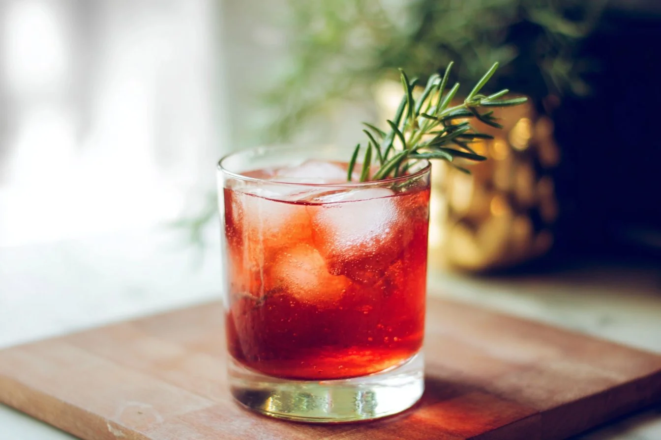 Rosemary Pom Spritzer, a delightful merry mocktail for festive occasions