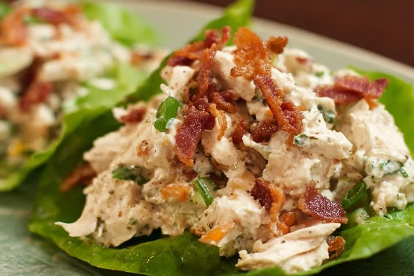 Bacon Ranch Chicken Salad 3 Bacon Ranch Chicken Salad with crispy bacon and fresh vegetables in a bowl